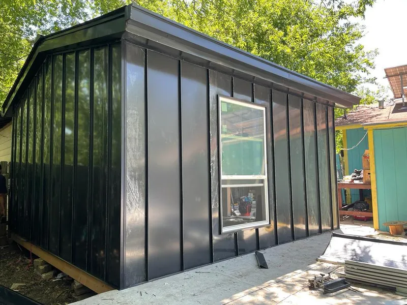 Black standing seam metal wall panels for Metal Roof Installation in Stone Mountain