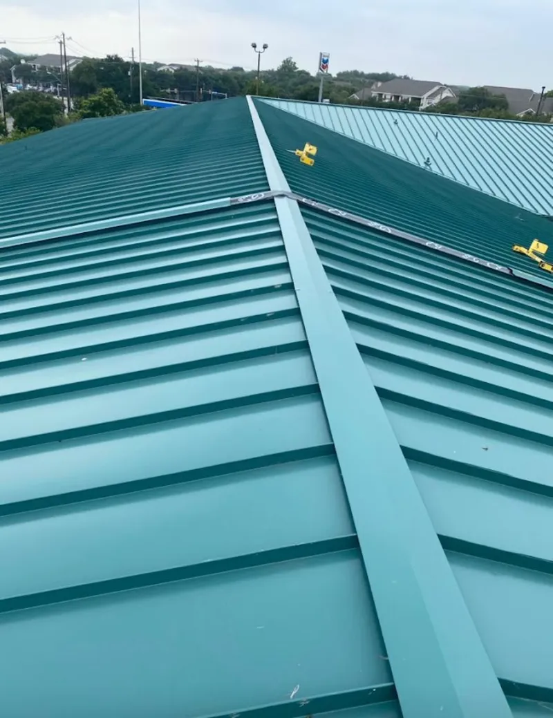 Green commercial metal roof ridge and valley for Metal Roof Repair in Stone Mountain